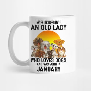 Never Underestimate An Old January Lady Who Loves Dogs Mug